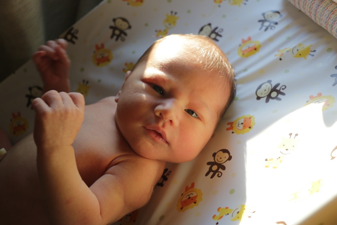 Newborn Baby on changing pad